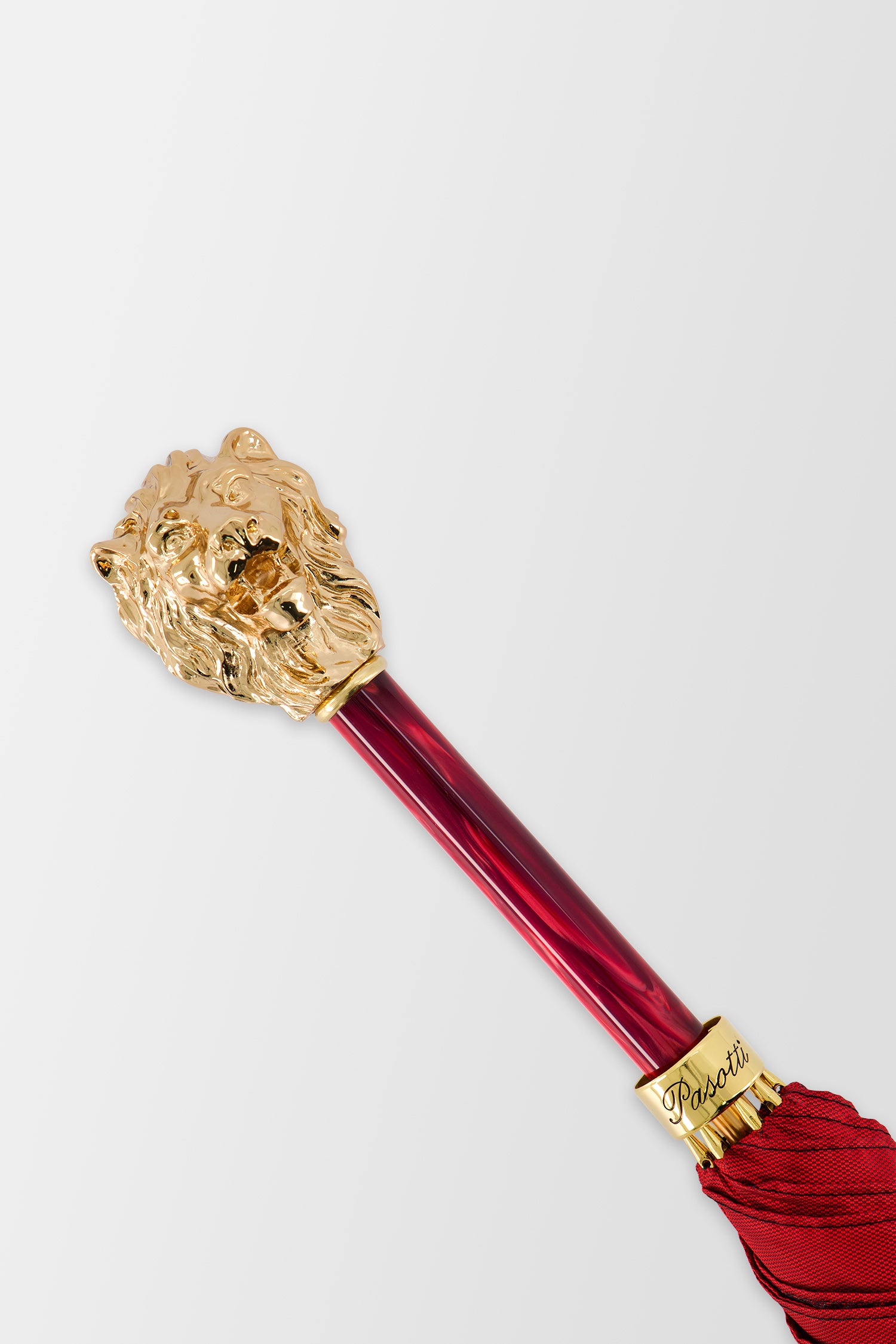 Parapluie rouge Pasotti avec poignée tête de lion dorée, avec étui et anneau