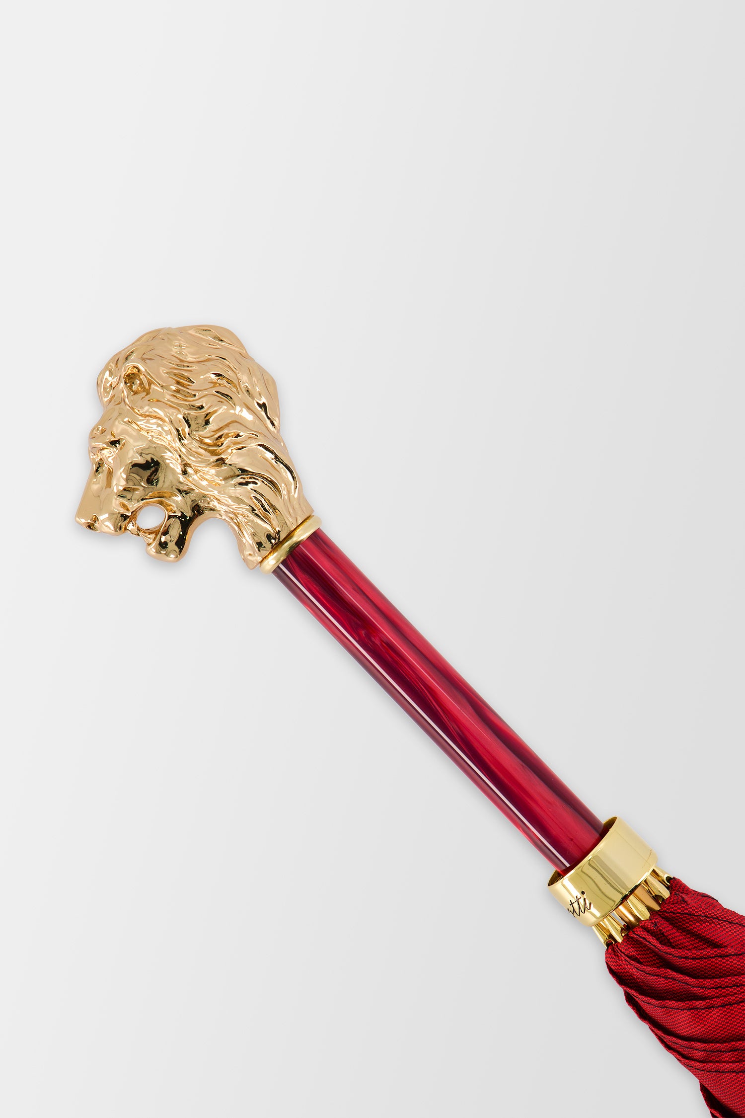 Parapluie rouge Pasotti avec poignée tête de lion dorée, avec étui et anneau