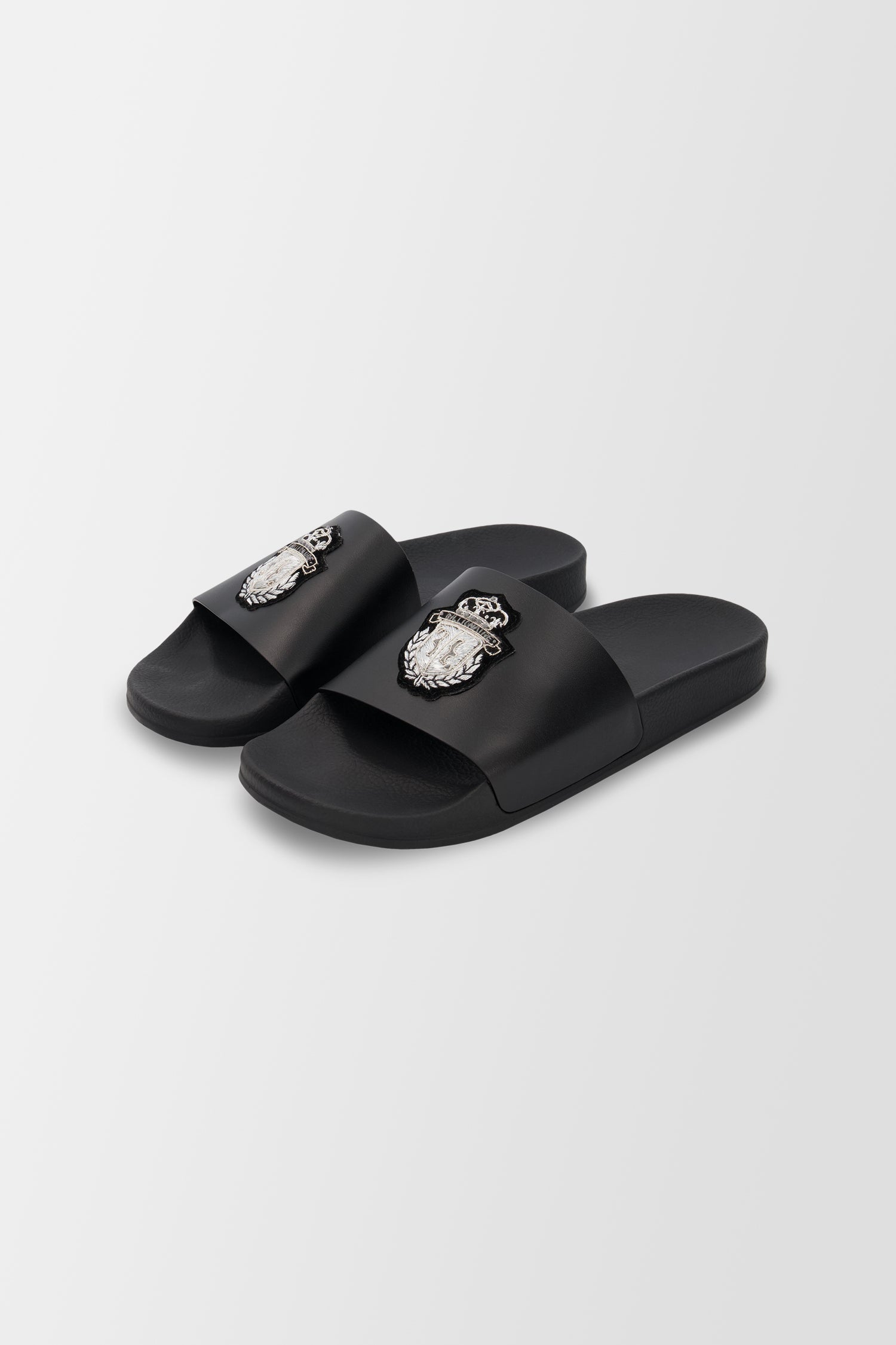 Claquettes noires à crête blanche de milliardaire