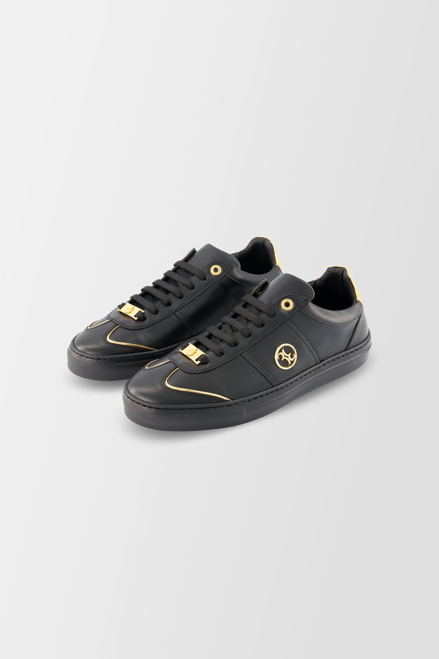 Mens black and hot sale gold trainers