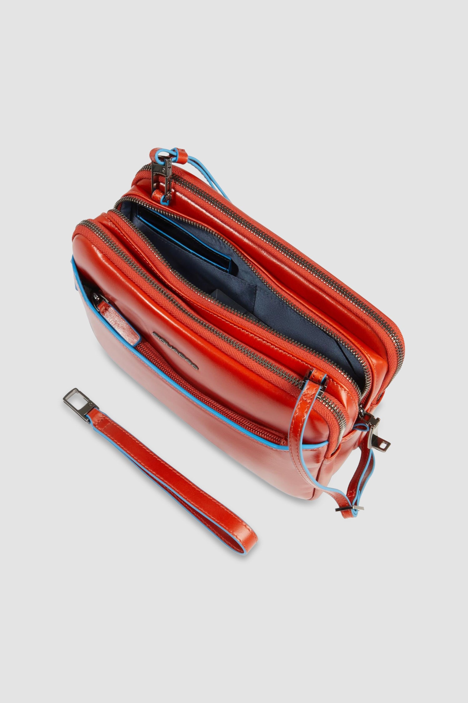 Pochette Piquadro orange avec verrouillage de sécurité par empreinte digitale
