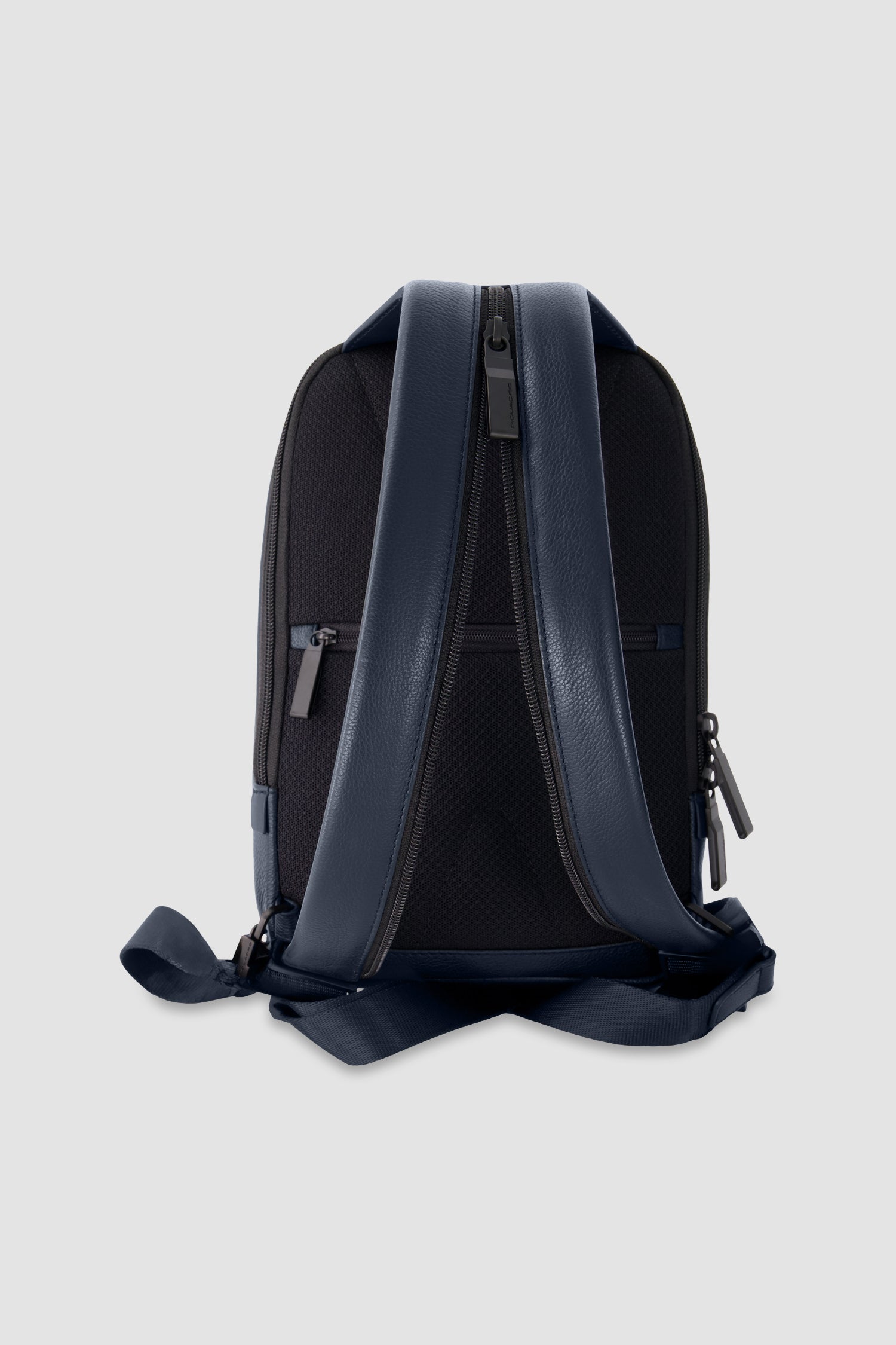 Sac à bandoulière Piquadro bleu convertible en sac à dos